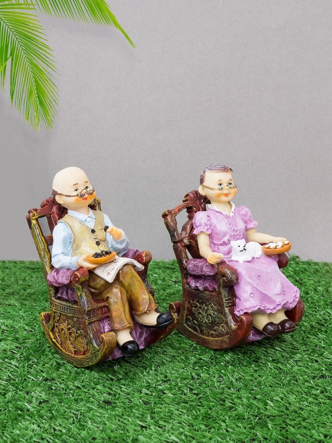 Golden Peacock Set Of 2 Brown & Purple Handcrafted Old Couple Sitting On Chair Polyresin Figurines
Golden Peacock Set Of 2 Brown & Purple Handcrafted Old Couple Sitting On Chair Polyresin Figurines
