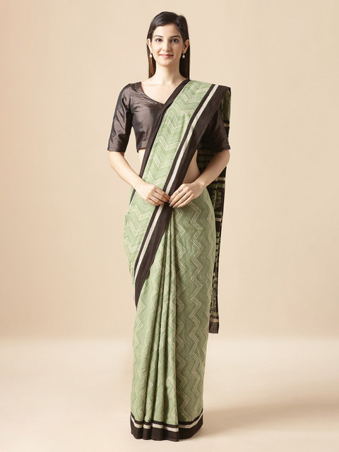 Taneira Green & Coffee Brown Pure Cotton Printed Dabu Saree 
Taneira Green & Coffee Brown Pure Cotton Printed Dabu Saree