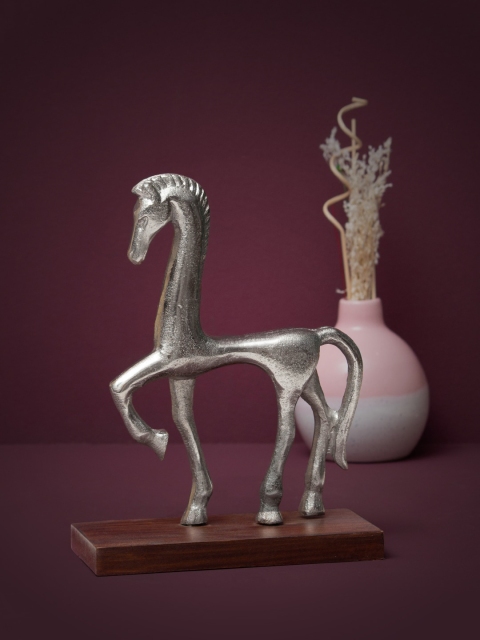 CASA DECOR Silver-Toned Nickel-Plated Textured Aluminium Handcrafted Sustainable Horse-Shaped Showpiece with Wooden Base
CASA DECOR Silver-Toned Nickel-Plated Textured Aluminium Handcrafted Sustainable Horse-Shaped Showpiece with Wooden Base