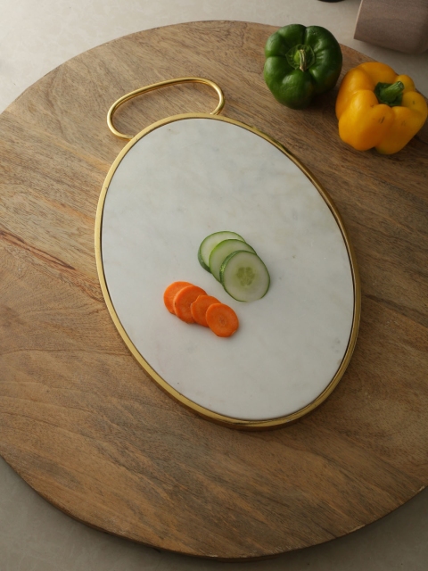 Amoliconcepts White & Gold Toned Solid Sustainable Chopping Board with Golden Metal Rim and Handle
Amoliconcepts White & Gold Toned Solid Sustainable Chopping Board with Golden Metal Rim and Handle