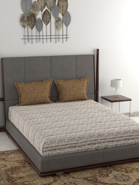 Trident Brown & Off-White Abstract 144 TC Cotton 1 Queen Bedsheet with 2 Pillow Covers
Trident Brown & Off-White Abstract 144 TC Cotton 1 Queen Bedsheet with 2 Pillow Covers
