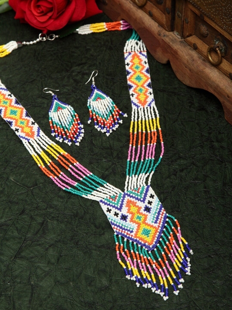 Moedbuille Hand Woven White Beaded Layered and Tasselled Design Handcrafted Afghan Jewelry Set
Moedbuille Hand Woven White Beaded Layered and Tasselled Design Handcrafted Afghan Jewelry Set