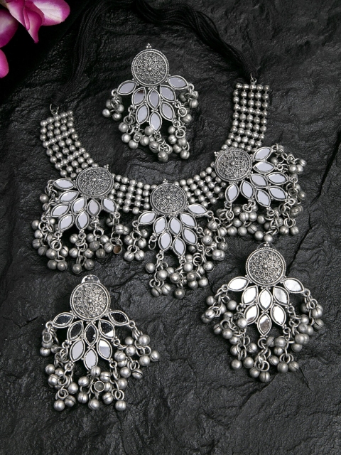 Moedbuille Mirrors & Ghungroo Studded Oxidised Silver Plated Handcrafted Jewelry Set with Ring
Moedbuille Mirrors & Ghungroo Studded Oxidised Silver Plated Handcrafted Jewelry Set with Ring