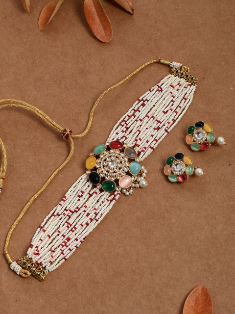 Silvermerc Designs Gold-Plated White Pearl Beaded Stone-Studded Jadau Navratna Jewellery Set
Silvermerc Designs Gold-Plated White Pearl Beaded Stone-Studded Jadau Navratna Jewellery Set
