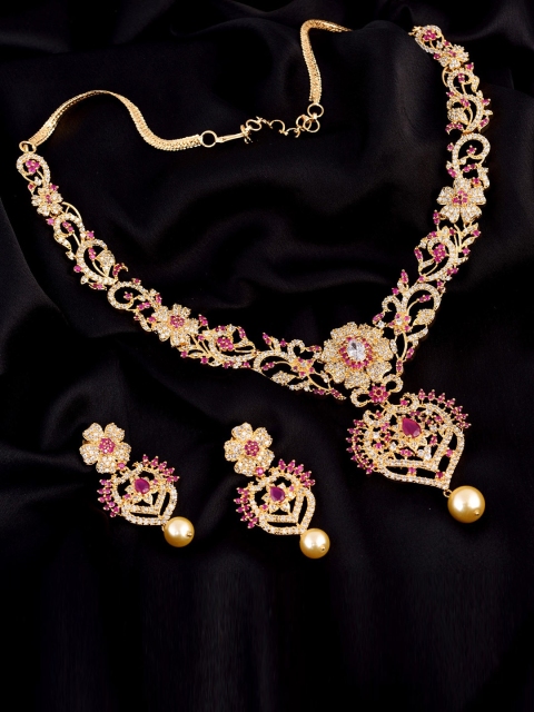 Saraf RS Jewellery Gold-Plated Magenta & White AD Studded Floral Design Handcrafted Jewellery Set
Saraf RS Jewellery Gold-Plated Magenta & White AD Studded Floral Design Handcrafted Jewellery Set