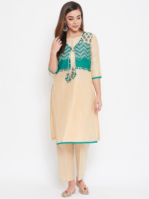 TULIP 21 Banarasi Chanderi Beige & Green Printed Kurta with Trouser & Attached Jacket set
TULIP 21 Banarasi Chanderi Beige & Green Printed Kurta with Trouser & Attached Jacket set