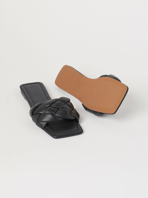 H&M Women Black Leather Slides
H&M Women Black Leather Slides