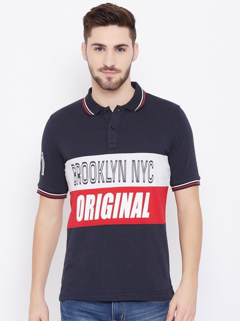 Austin wood Men Navy Blue & White Typography Colourblocked Polo Collar Applique T-shirt
Austin wood Men Navy Blue & White Typography Colourblocked Polo Collar Applique T-shirt