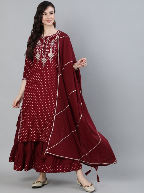 Ishin DESIGNER STUDIO Maroon Ethnic Motifs Printed Straight Kurta with Sharara & Dupatta
Ishin DESIGNER STUDIO Maroon Ethnic Motifs Printed Straight Kurta with Sharara & Dupatta