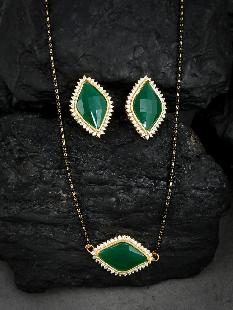 Silvermerc Designs Gold-Plated Green & Black Stone-Studded & Beaded Mangalsutra With Earrings
Silvermerc Designs Gold-Plated Green & Black Stone-Studded & Beaded Mangalsutra With Earrings