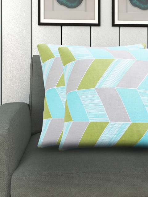 Home Centre Set Of 2 Turquoise Blue & Olive Green Printed Ebony Grace Printed Filled Cushions 
Home Centre Set Of 2 Turquoise Blue & Olive Green Printed Ebony Grace Printed Filled Cushions