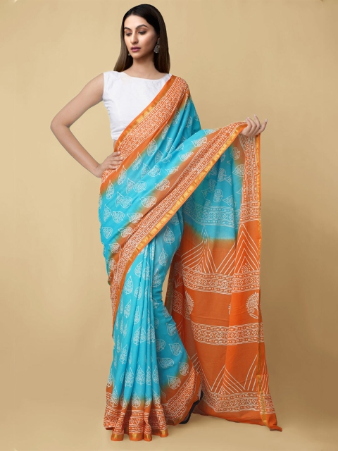 Unnati Silks Turquoise Blue & Orange Ethnic Motifs Mulmul Cotton Hand Block Print Saree
Unnati Silks Turquoise Blue & Orange Ethnic Motifs Mulmul Cotton Hand Block Print Saree
