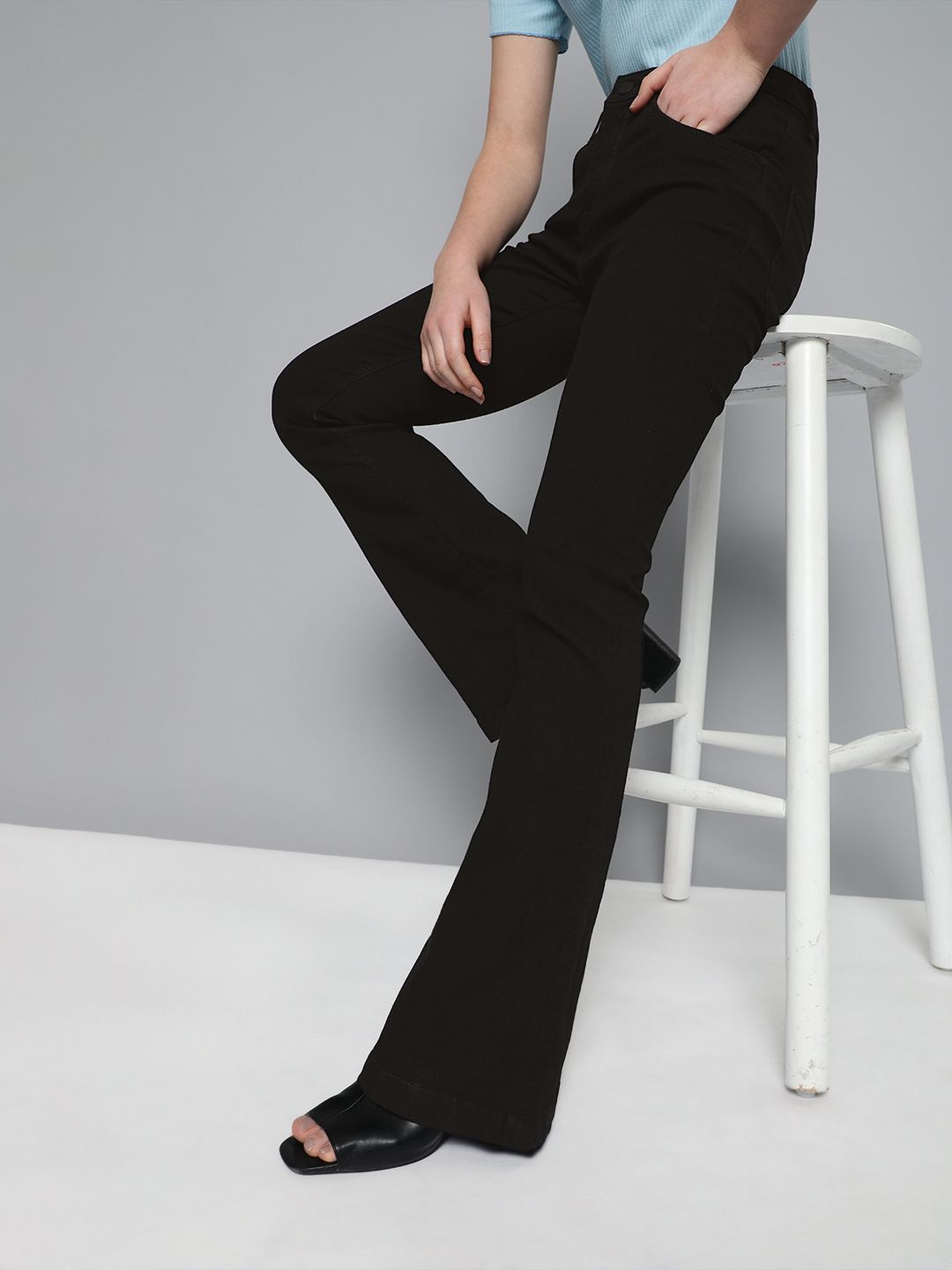 HERE&NOW Women Black Solid High-Rise Flared Clean Look Stretchable Jeans