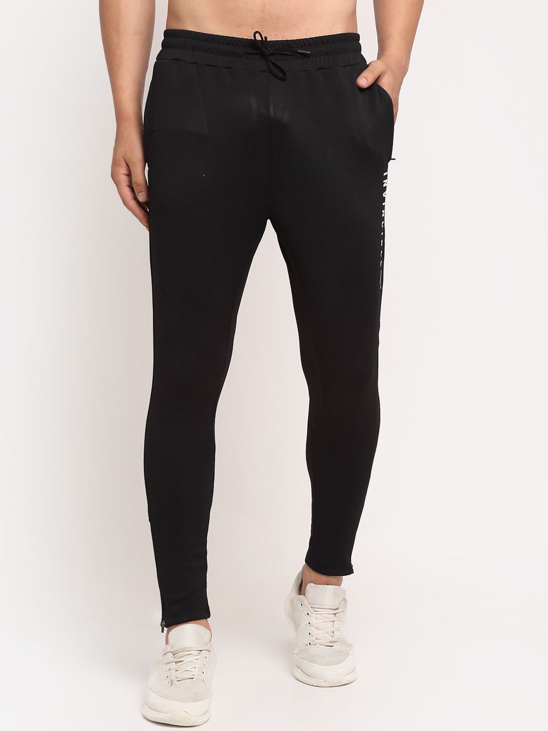 Buy Invincible Invincible Men Black Solid Bold Track Pants at Redfynd