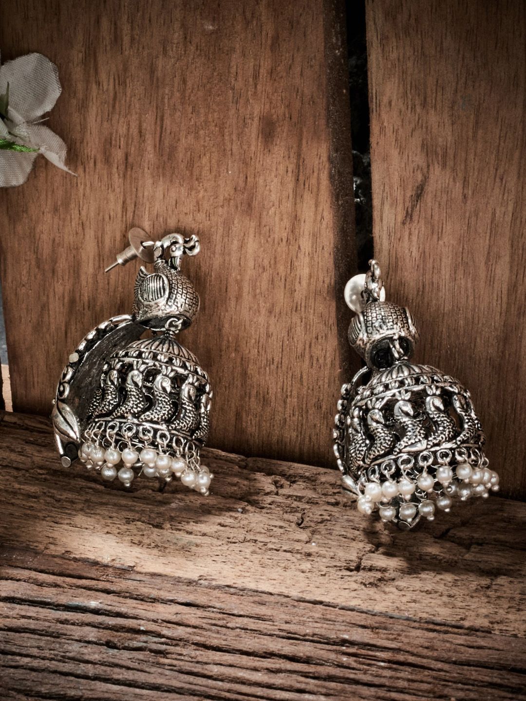 ATIBELLE Silver-Plated Oxidised Peacock Shaped Jhumkas Earrings