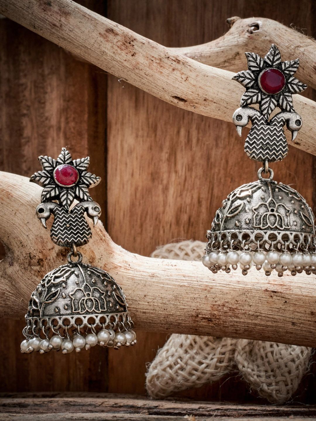 ATIBELLE Silver-Plated Peacock Shaped Jhumkas Earrings