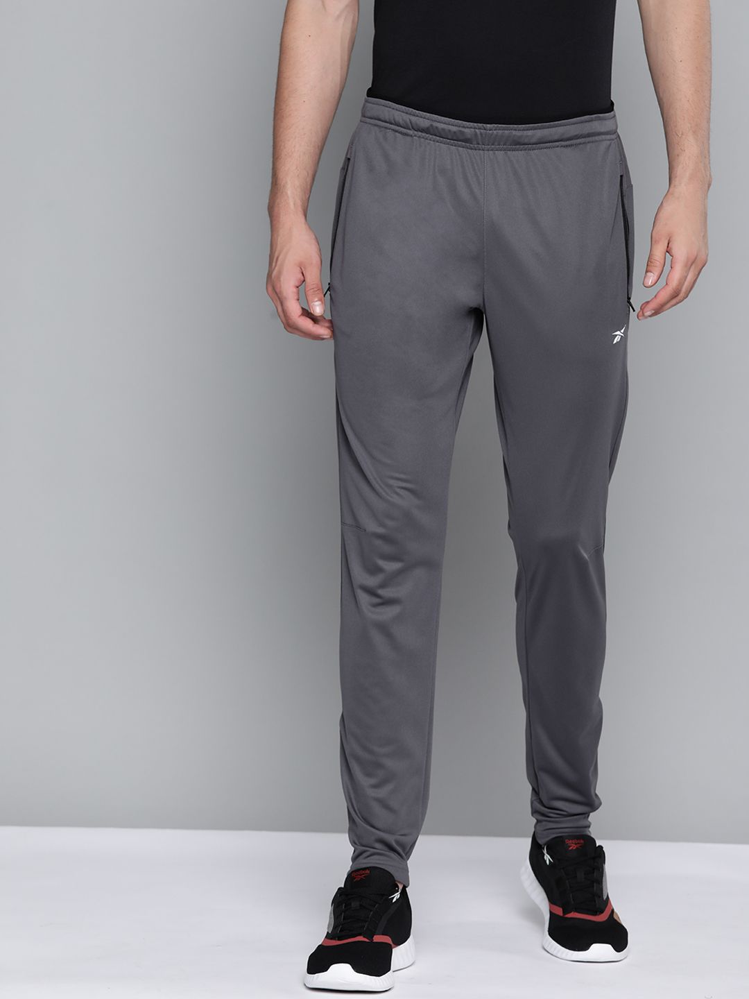 Reebok solid sale men's track pants