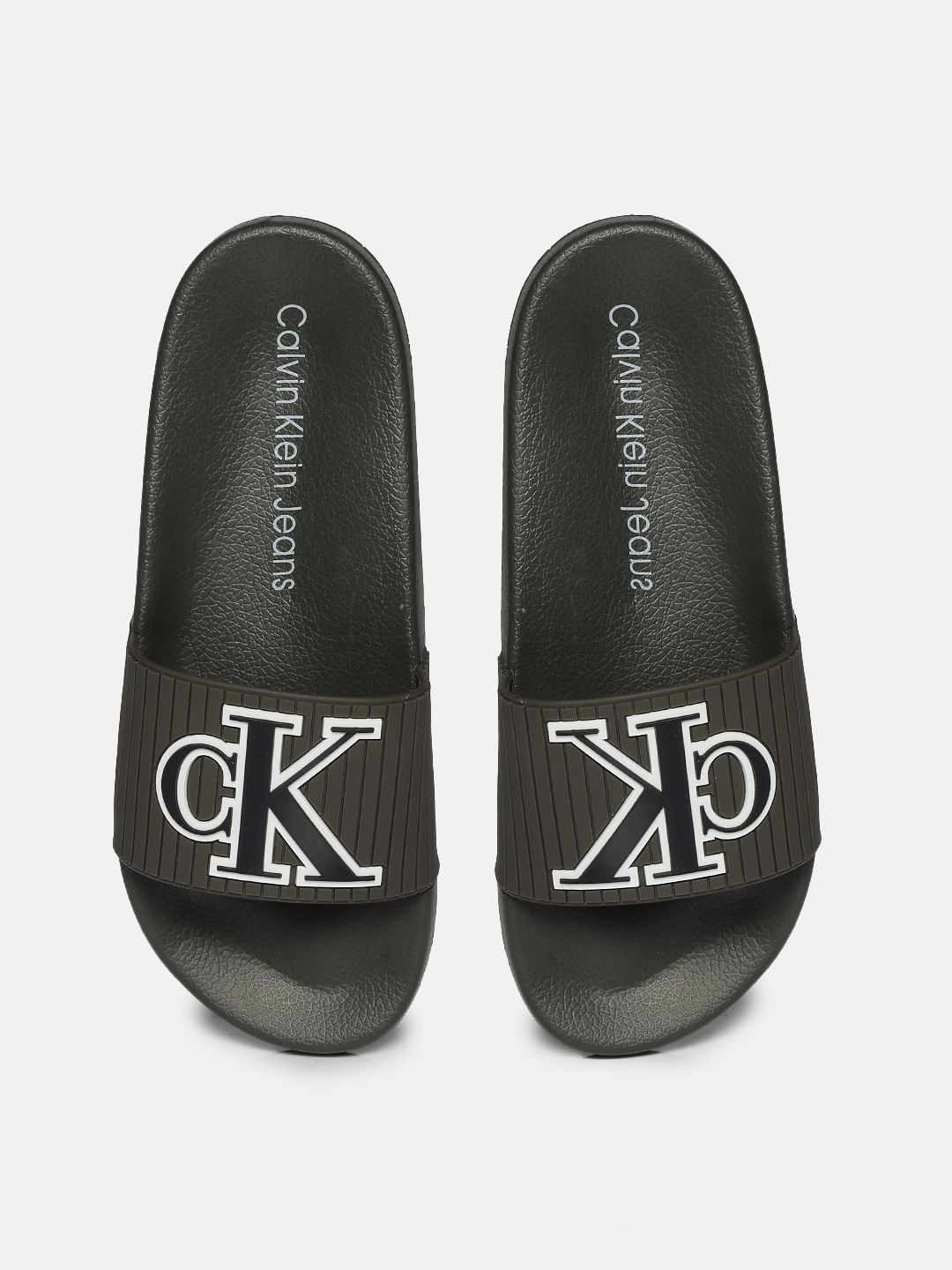 Buy Calvin Klein Calvin Klein Men Black Aura Sliders at Redfynd