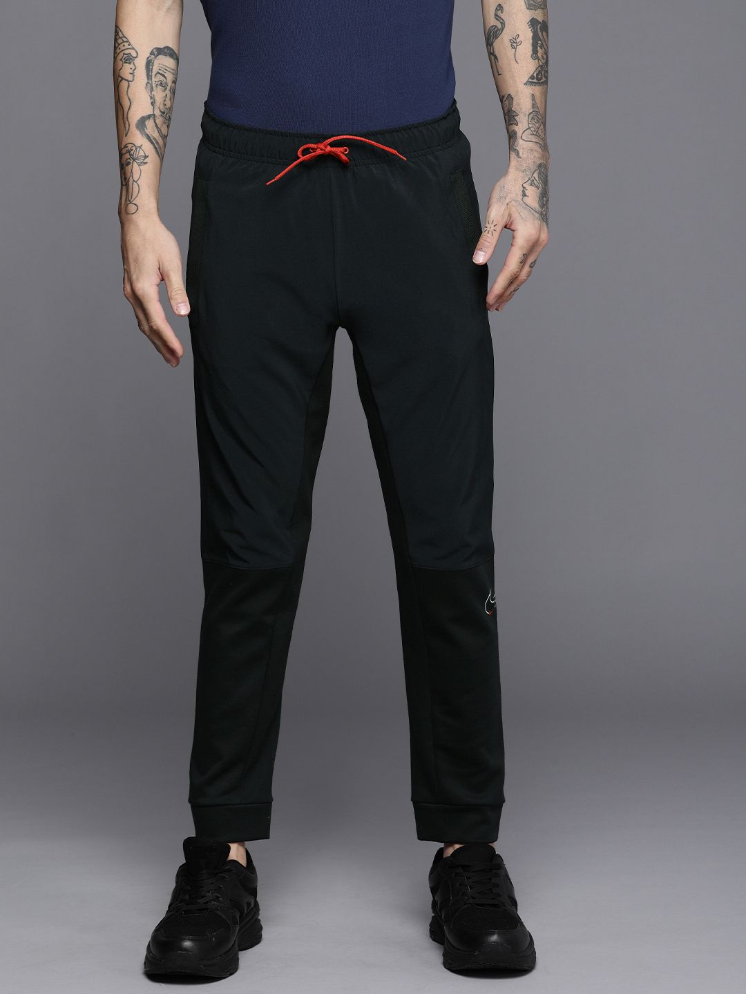 Buy Nike Solid Track Pants Online In India