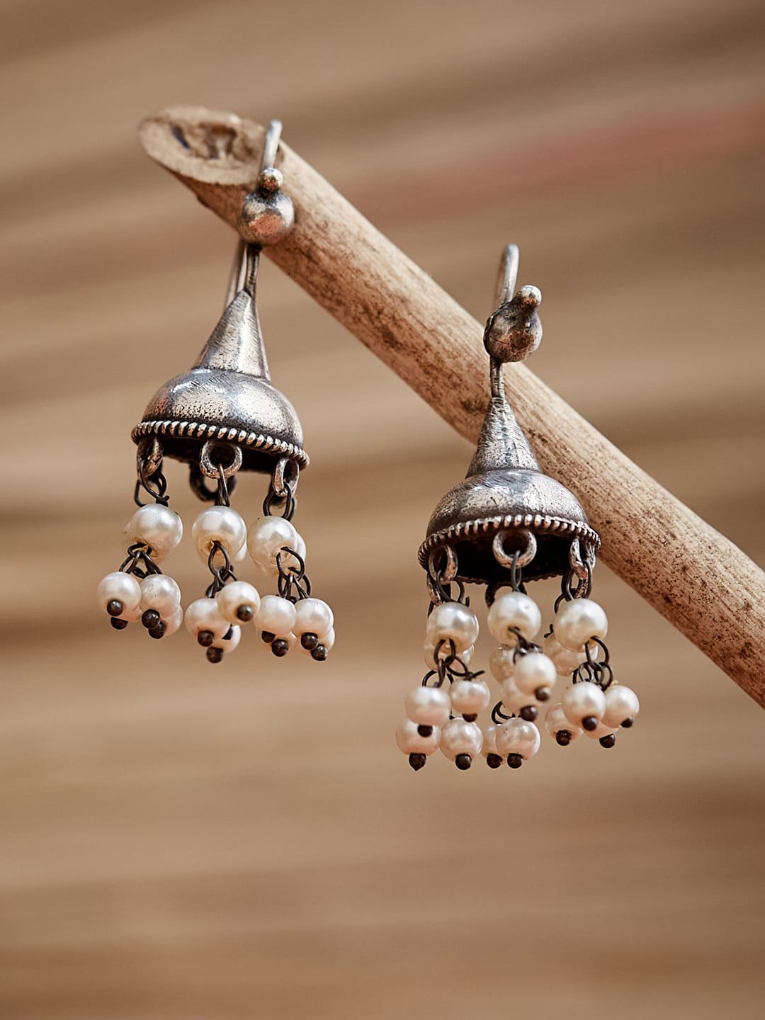 ATIBELLE Silver-Toned Contemporary Jhumkas Earrings with Beads drop