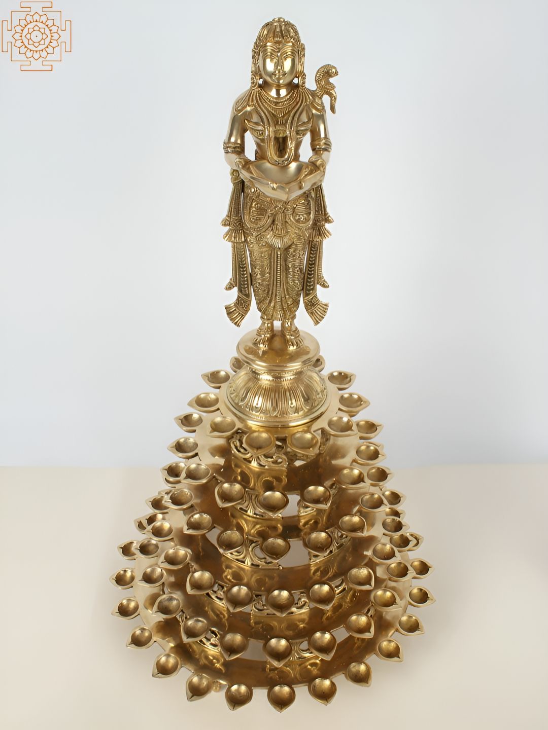 Exotic India Gold-Toned Brass Deep Lakshmi 108 Wicks Lamp-picture-37