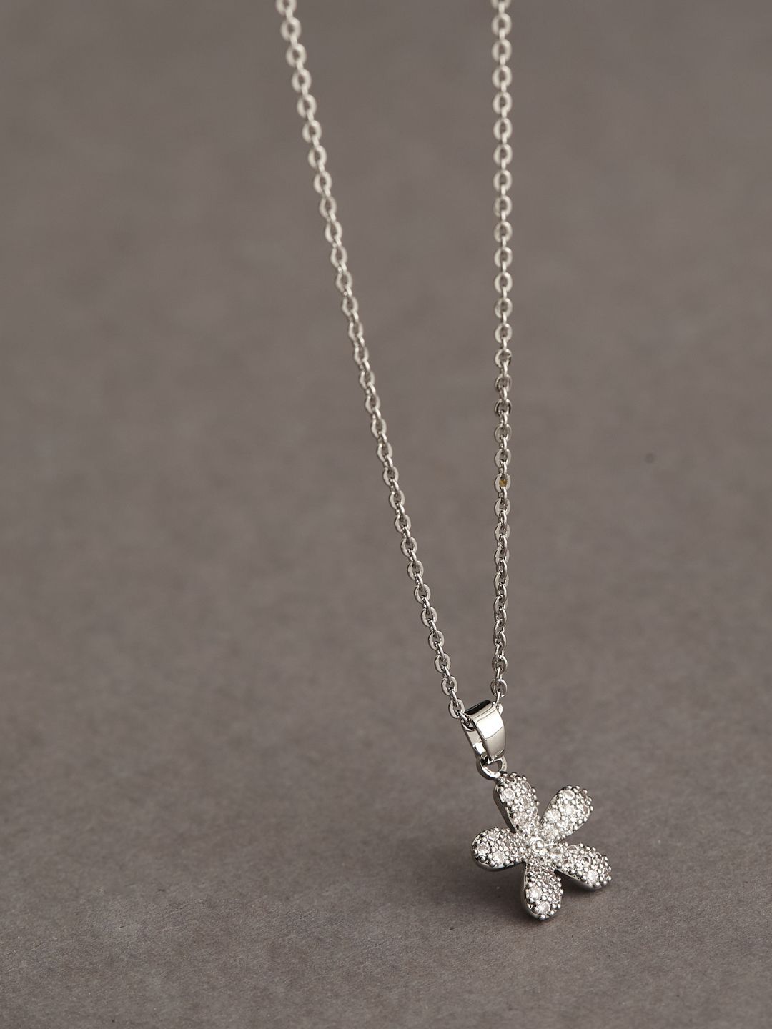 ATIBELLE Silver Plated Cubic Zirconia Stone Studded Floral Shaped Pendant With Chain