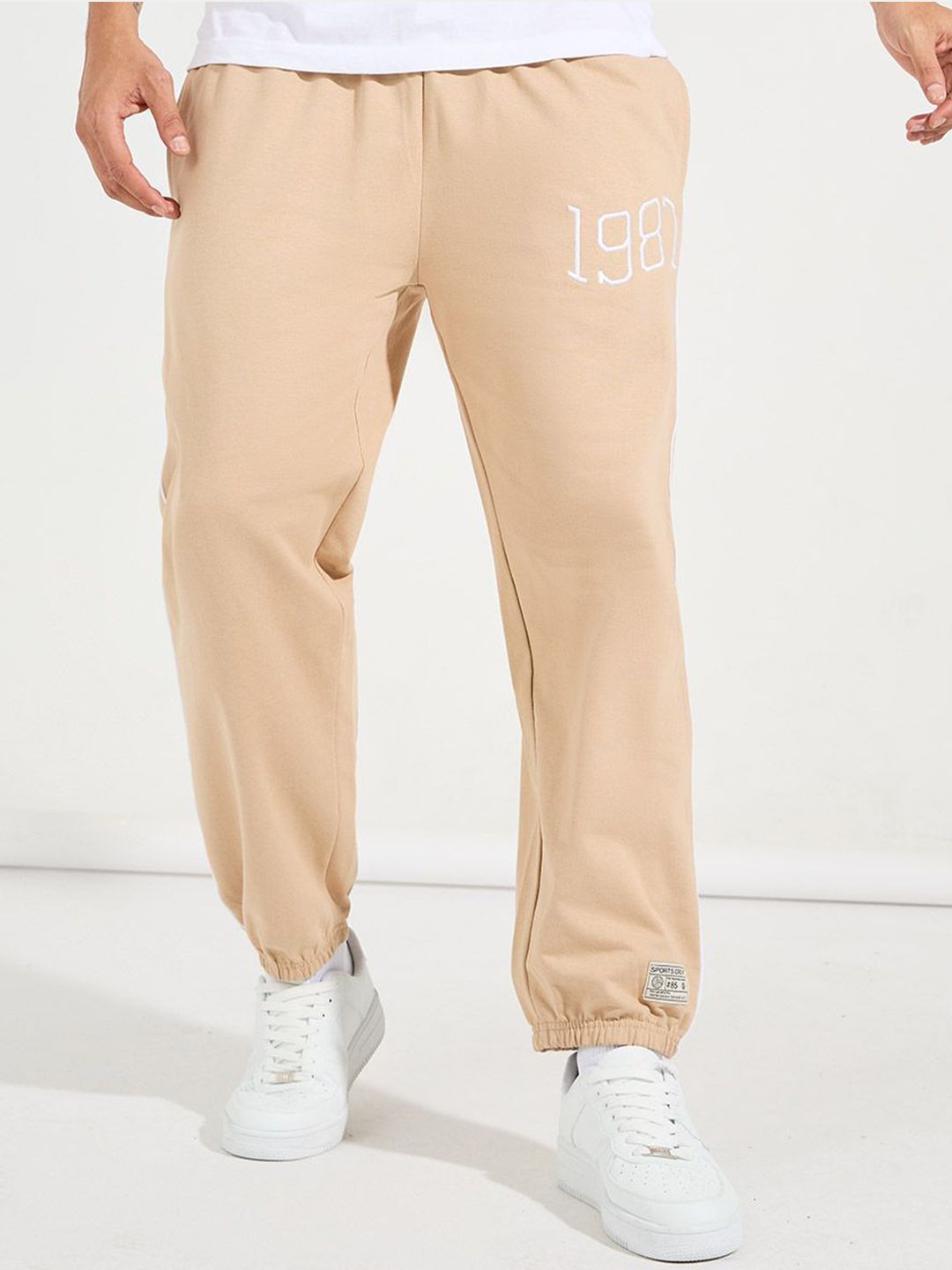 Styli Men Beige Relaxed Fit Pure Cotton Terry Jogger With Side Cord And Embroidery Detail-picture-14
