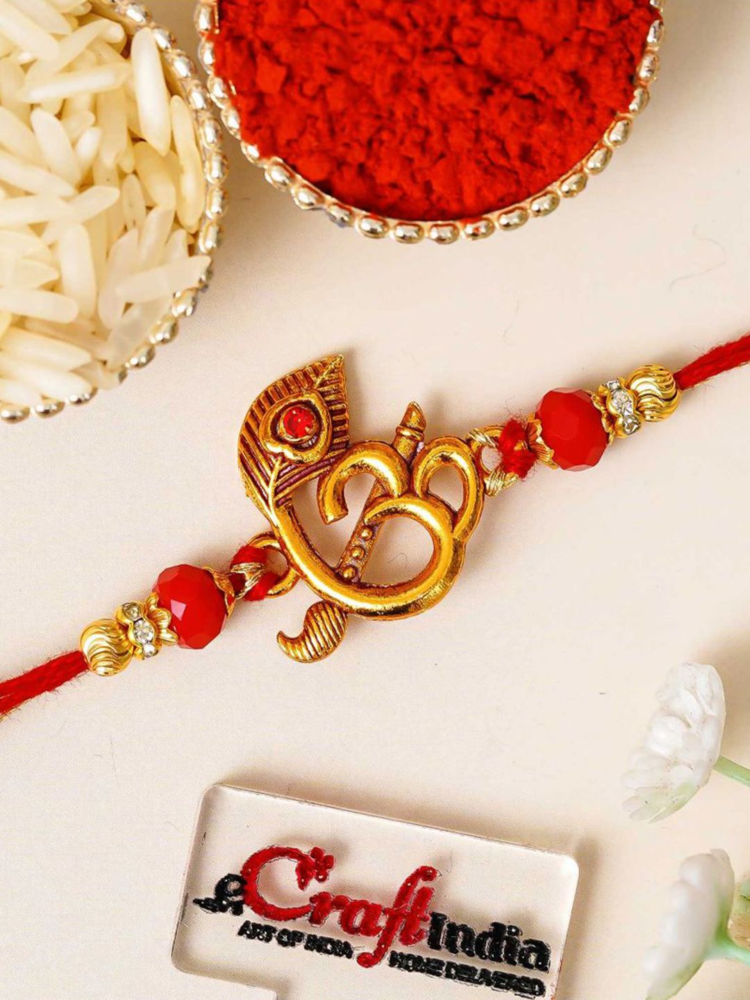 eCraftIndia Stones Studded Peacock Feather Flute Om Design Thread Rakhi-picture-22