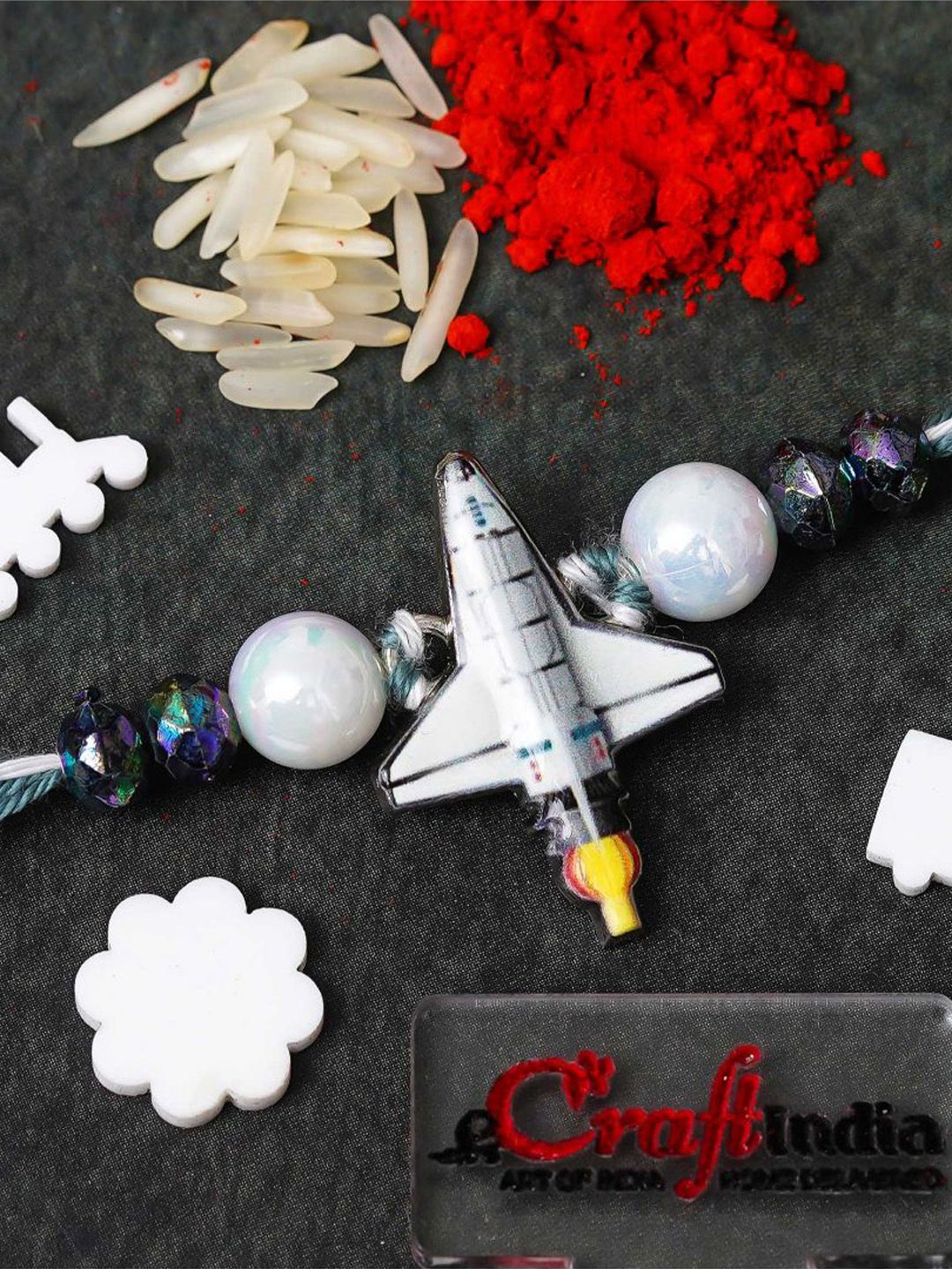 eCraftIndia Artfificial Stones Studded And Beaded Space Shuttle Rakhi-picture-52