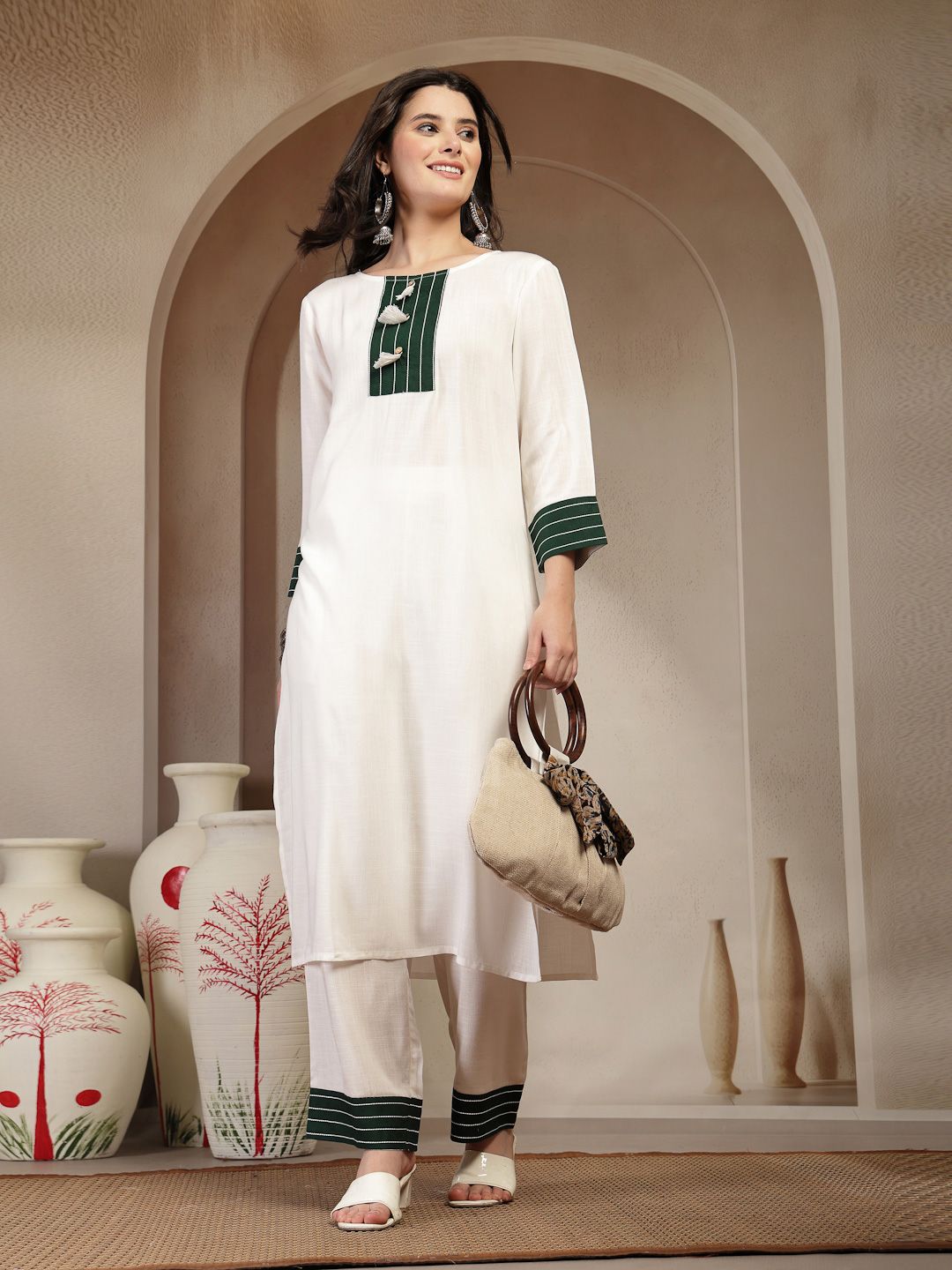 Women Solid Kurta with Trousers