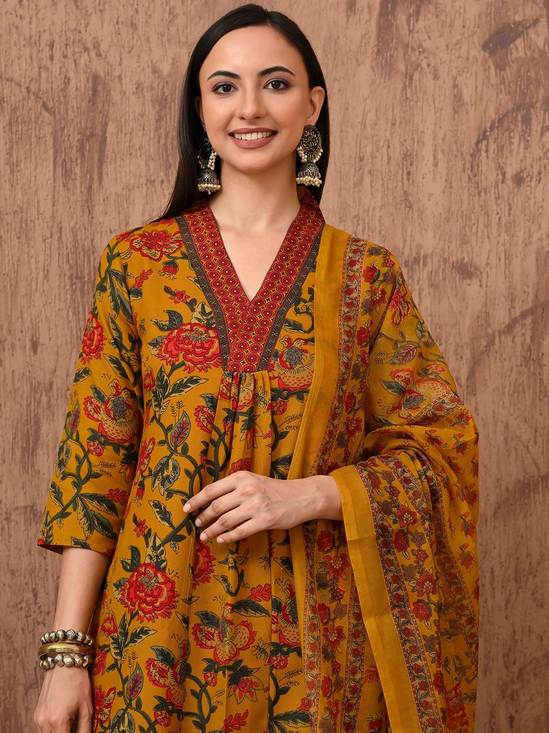 Anouk Rustic Floral Printed Pleated V-Neck A-Line Kurta With Trousers & Dupatta