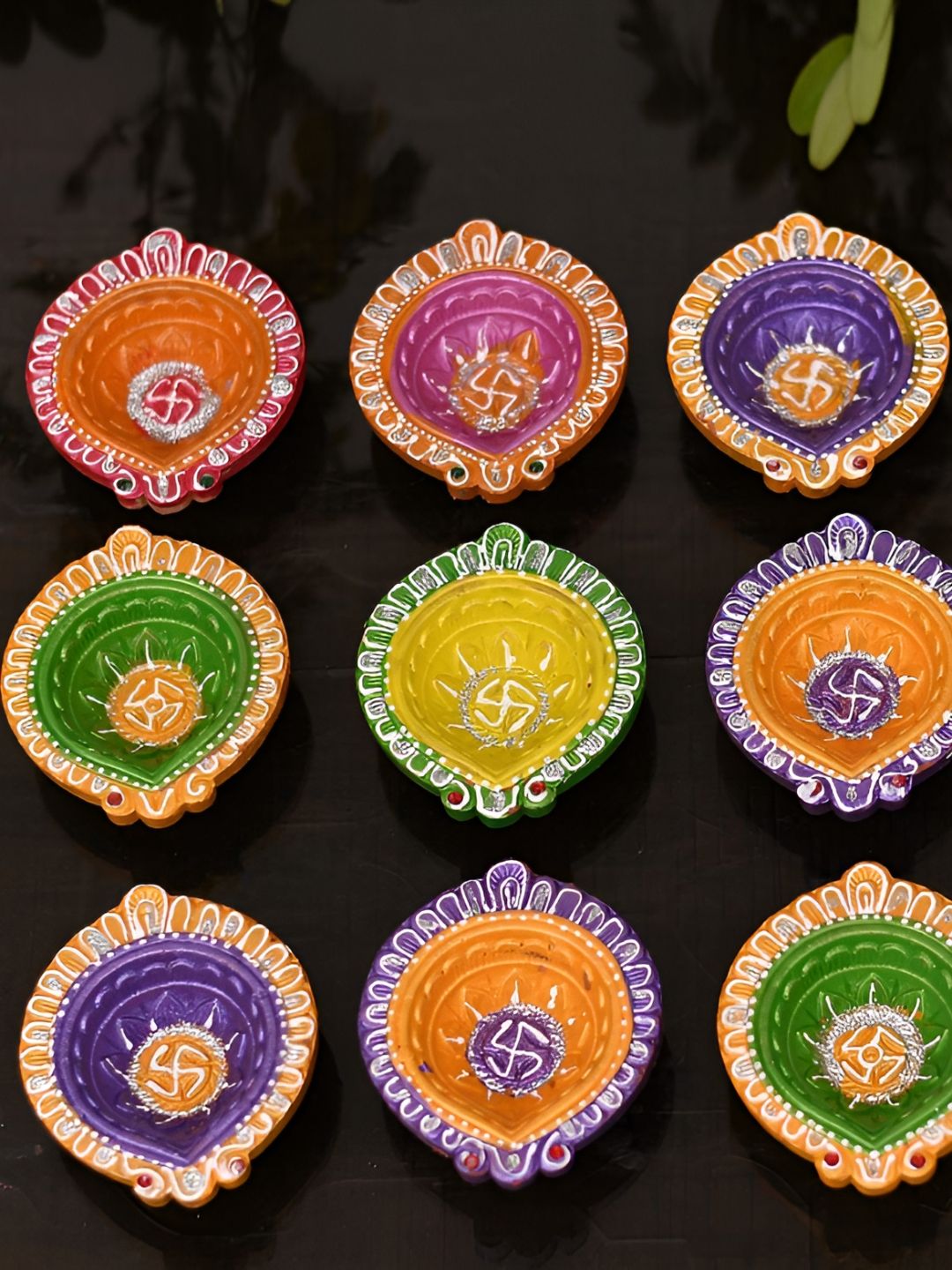 CraftVatika Orange Colored & Green 4 Pieces Textured Diyas