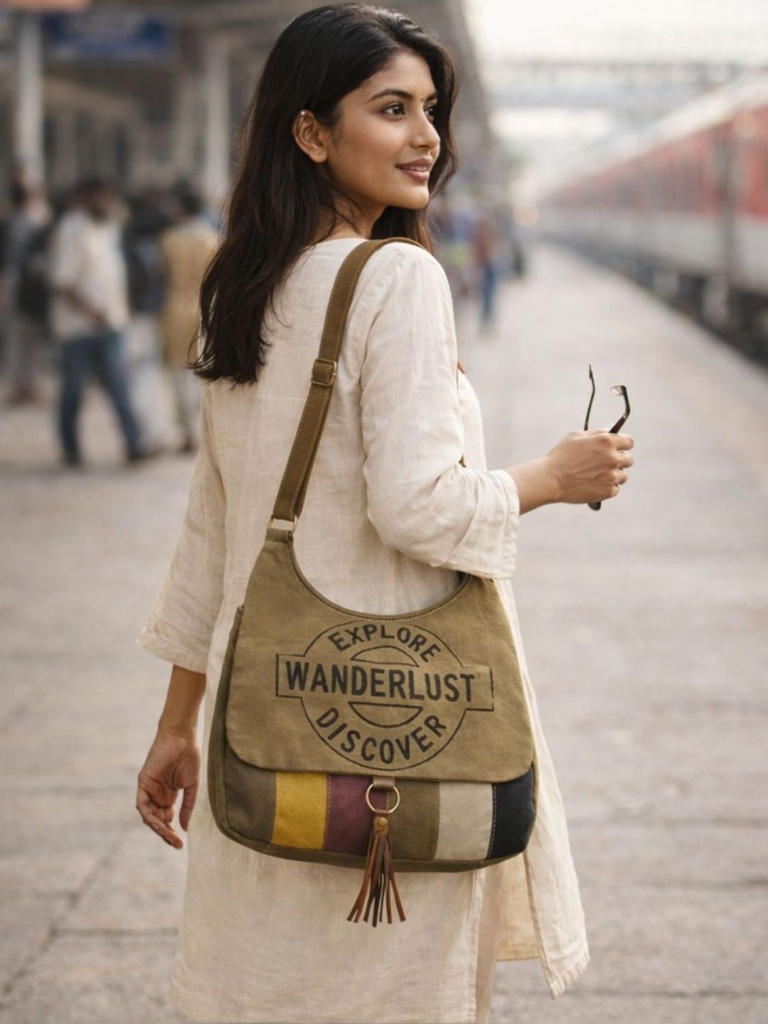 Atri Colourblocked Sling Bag with Tasselled-picture-30