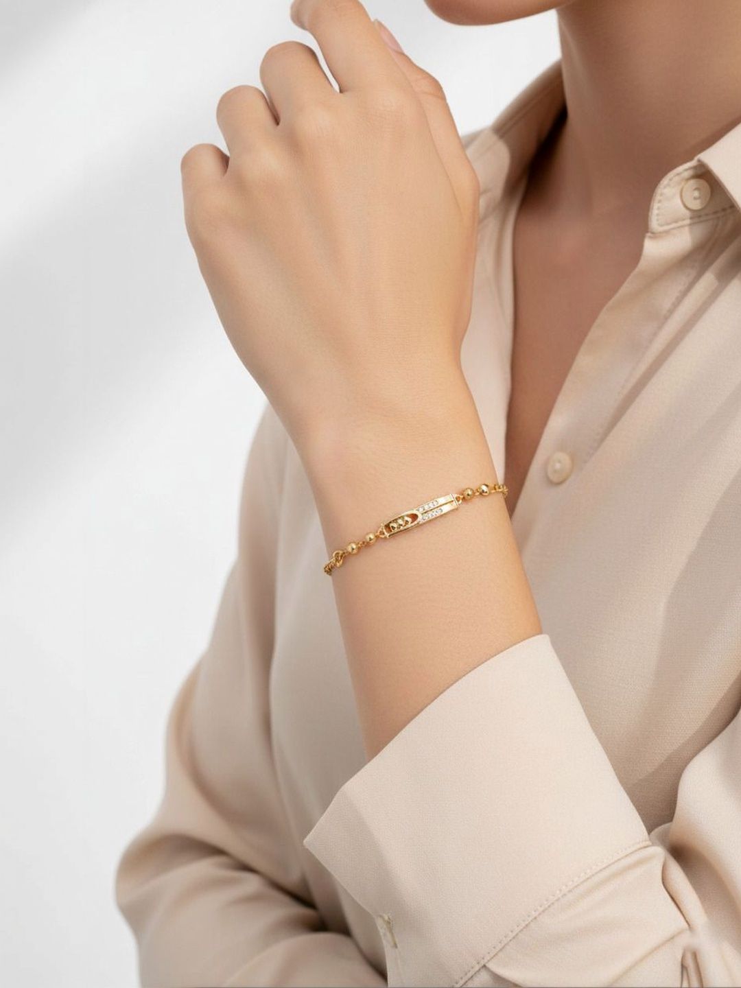 DIVASTRI Women Brass American Diamond Gold-Plated Link Bracelet