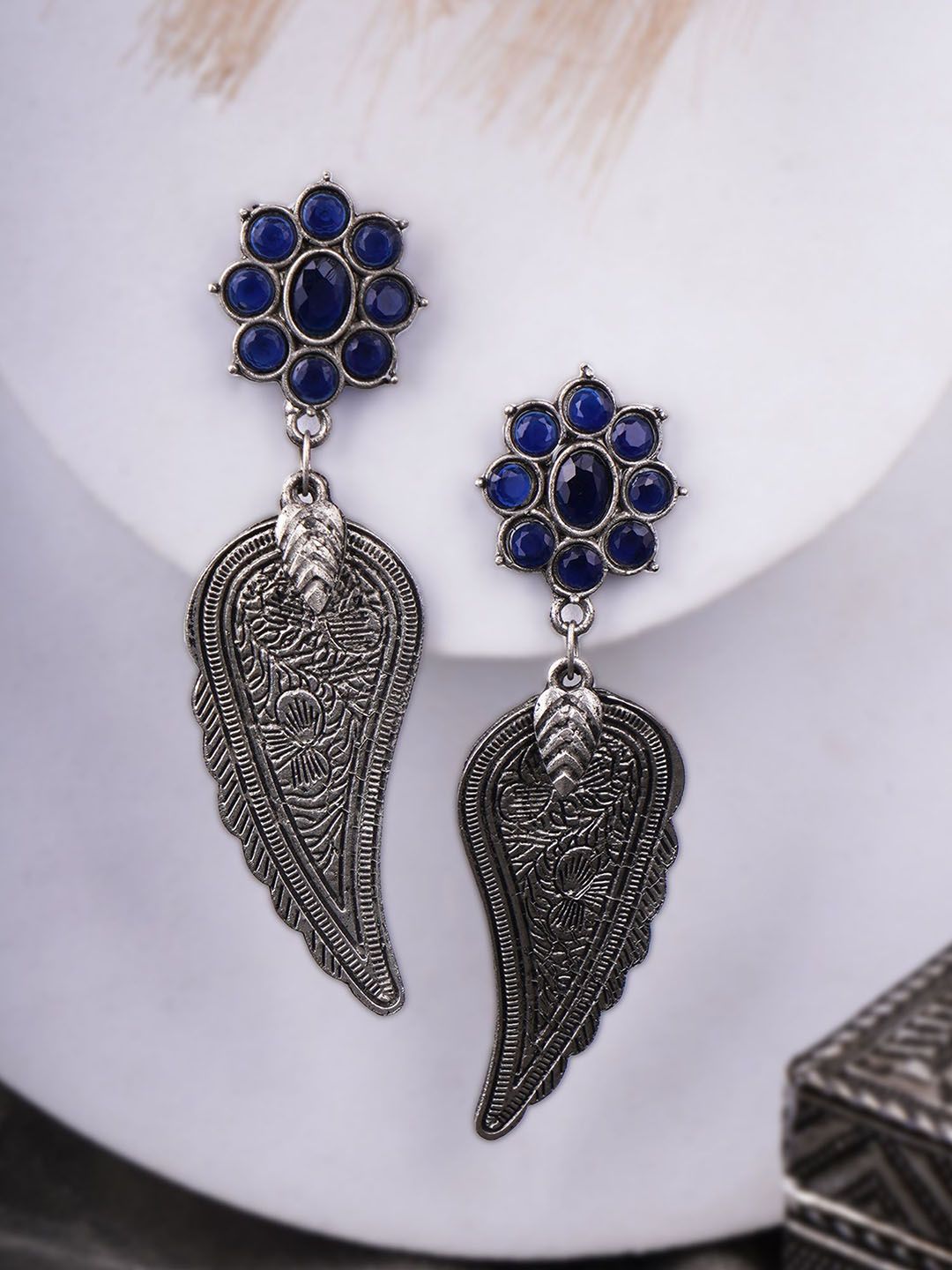 Sangria Blue Silver-Plated Artificial Stones Studded Leaf Shaped Oxidised Drop Earrings-image-16
