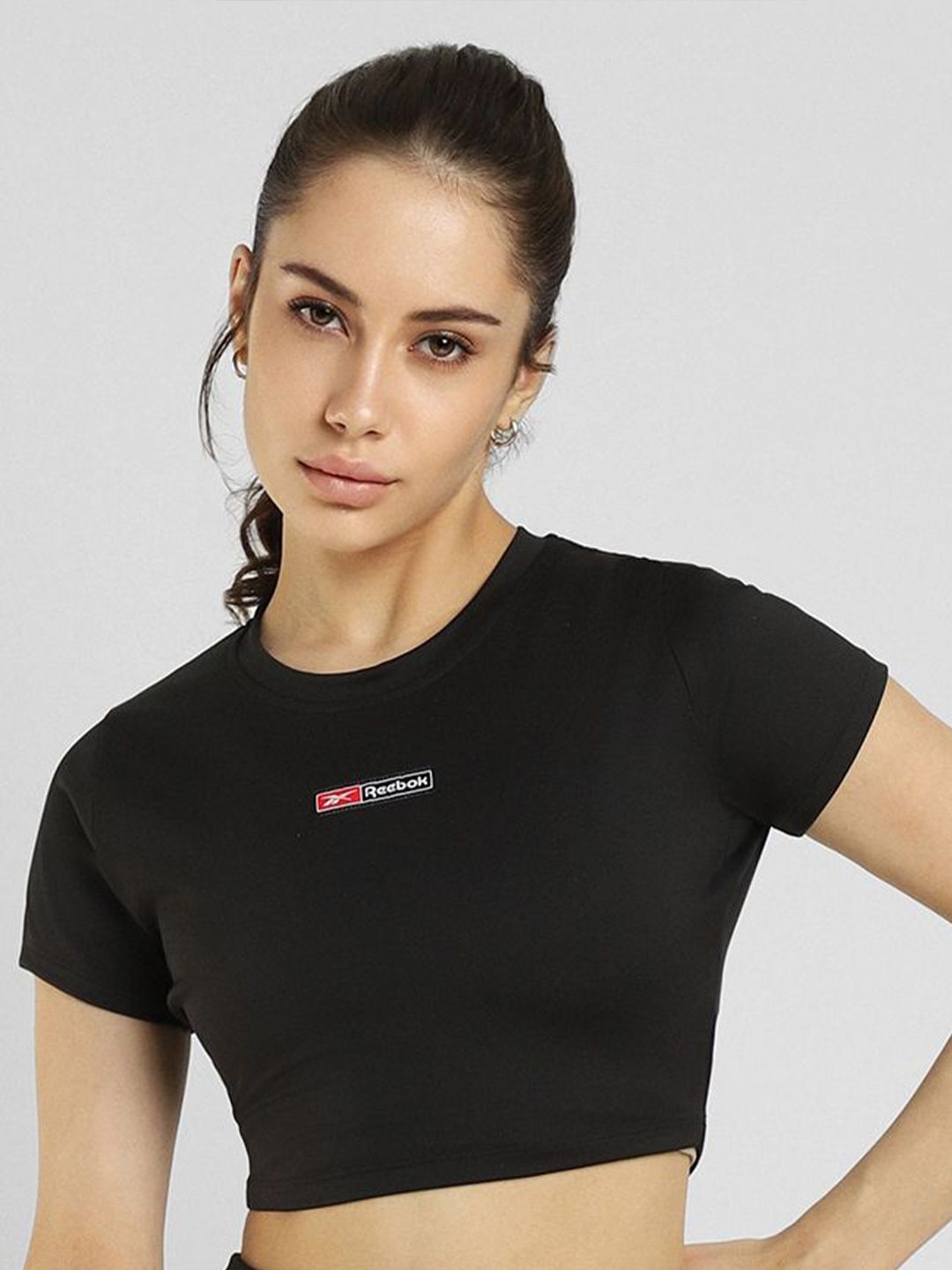 Reebok Women Solid Round Neck Slim Fit T-shirt-picture-24