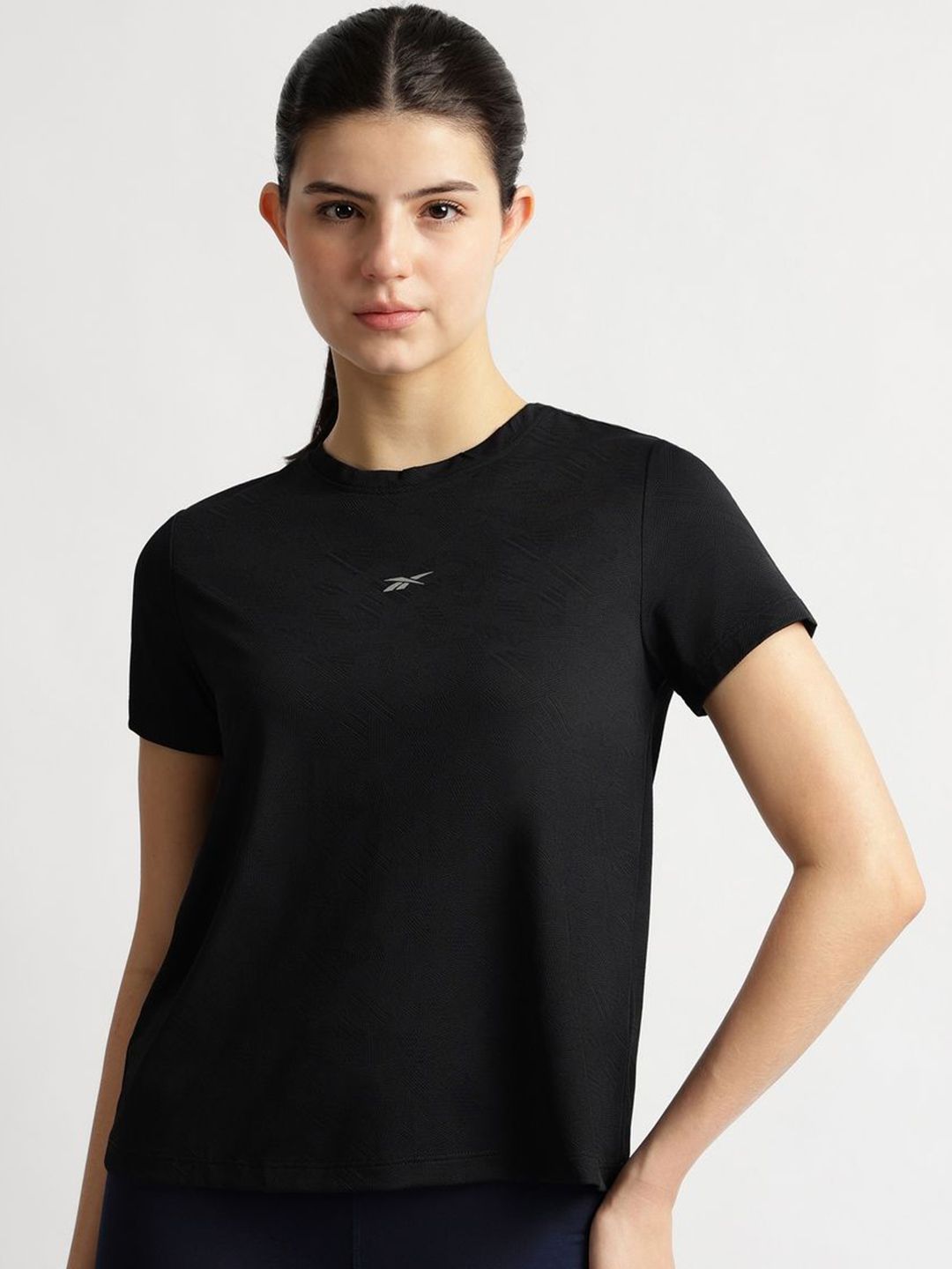 Reebok Women Solid Round Neck T-shirt-picture-13