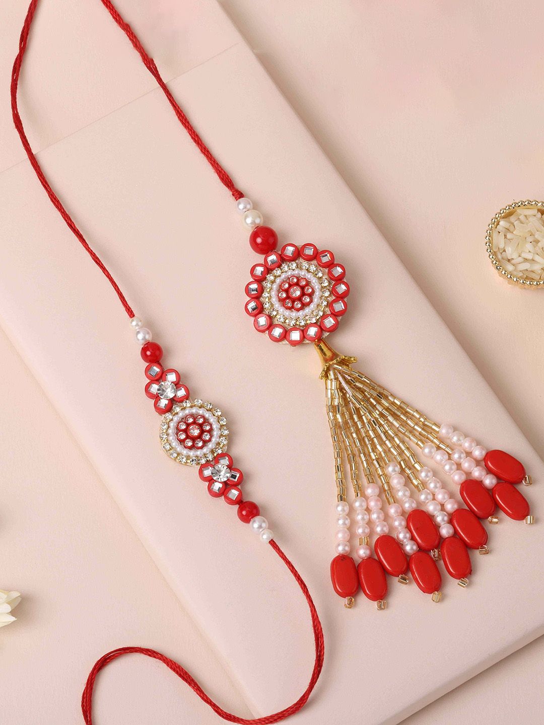 fnp Artificial Stones Studded & Beaded Radiant Harmony Bhaiya Bhabhi Rakhis-picture-34