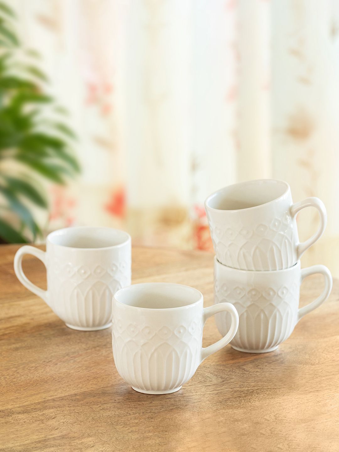 ExclusiveLane White 4 Pieces Textured Ceramic Glossy Cups-picture-39