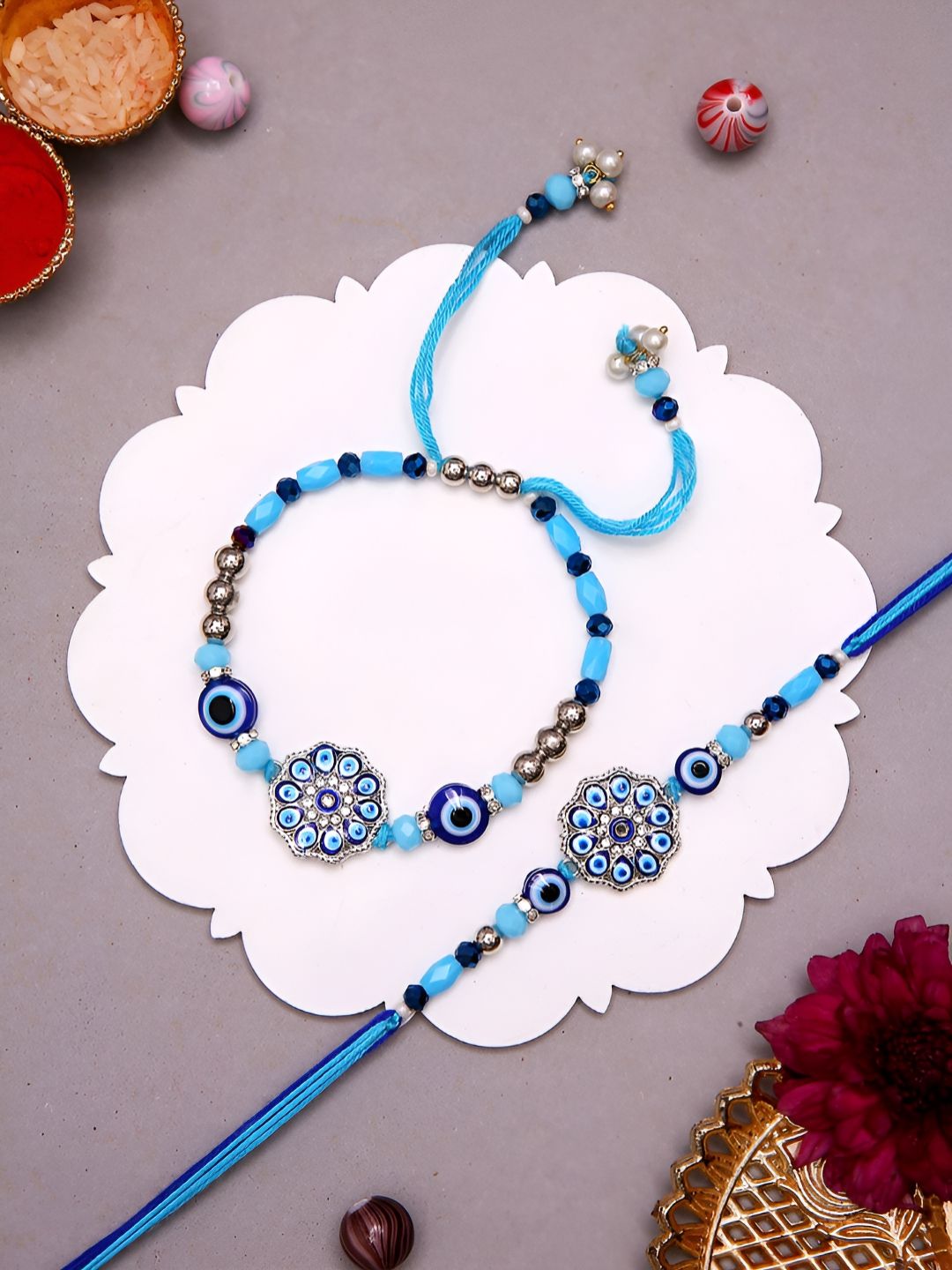 Myntra Elegant Homes Set Of 2 Rakhis With Greeting Card & Roli Chawal-image-28