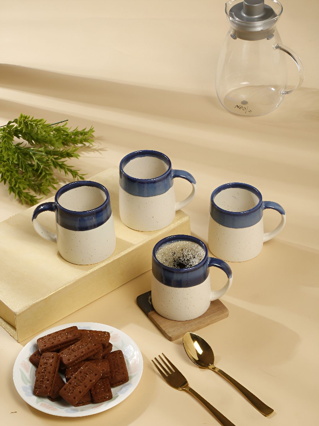 Myntra Elegant Homes Blue & White Handcrafted and Hand Painted Solid Ceramic Glossy Mugs Set of Cups and Mugs-image-10
