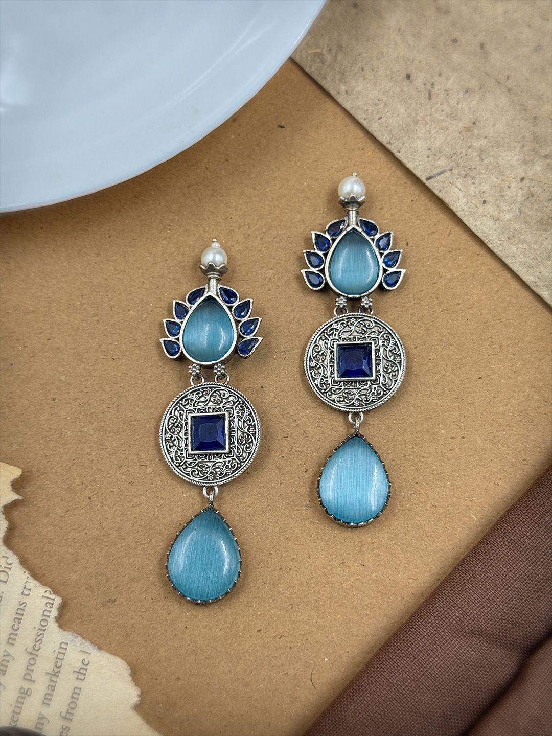 NAMAN ARTS Silver-Plated Oxidised Stones Studded Tear Drop Shaped Drop Earrings-picture-32