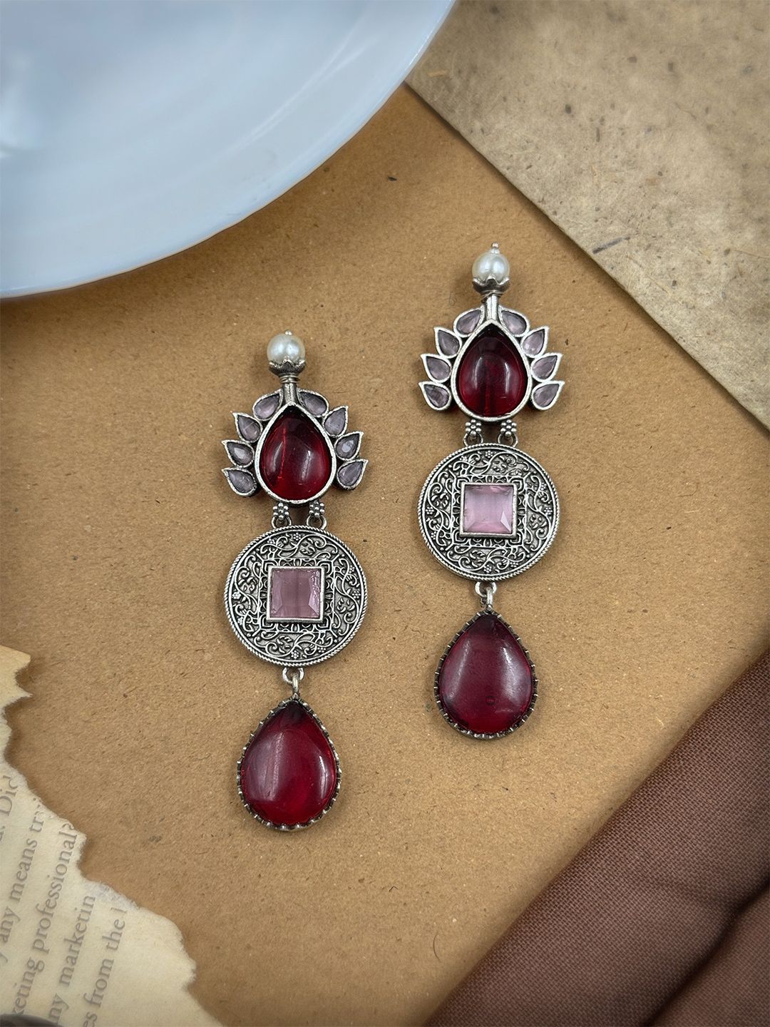 NAMAN ARTS Silver-Plated Oxidised Artificial Stones Studded Tear Drop Shaped Drop Earrings-picture-17