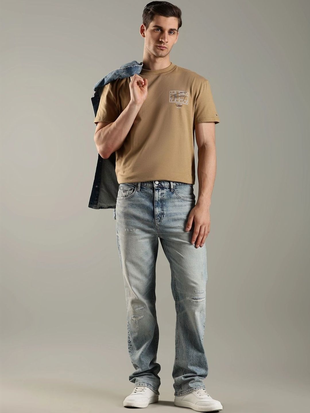 Tommy Hilfiger Men Regular Fit Mid-Rise Low Distress Light Fade Jeans deal from myntra
