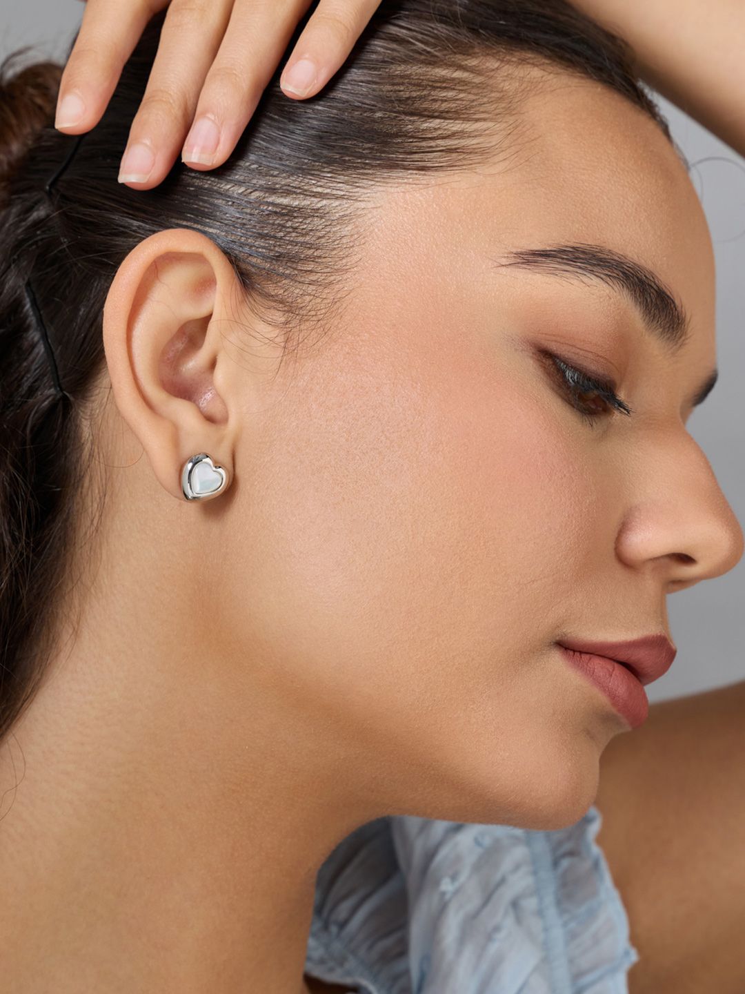 Kushal's Fashion Jewellery Rhodium-Plated Heart Shaped Zircon Studded Studs Earrings-picture-41