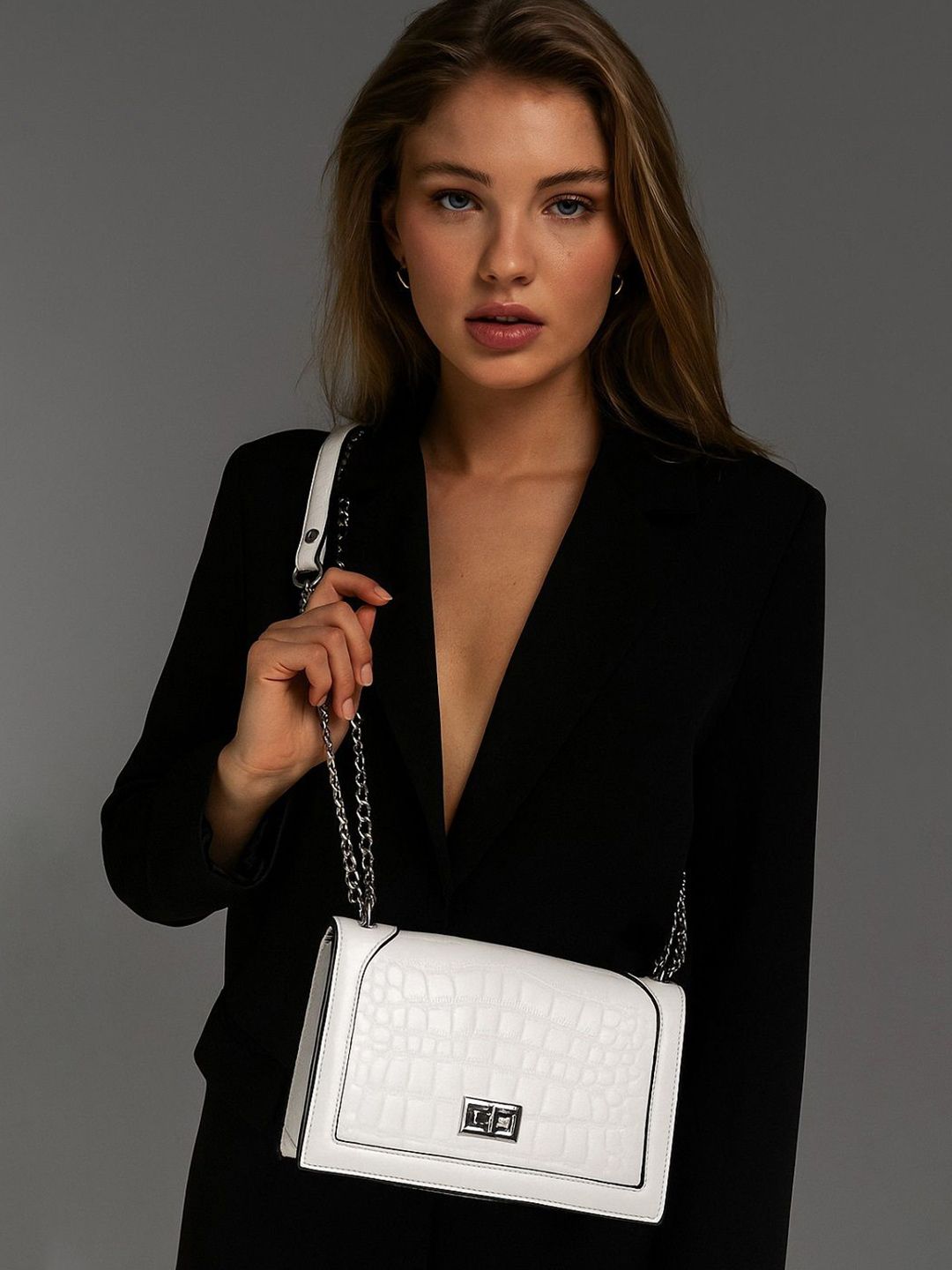 Donicy Textured PU Sling Bag with Tasselled-picture-34