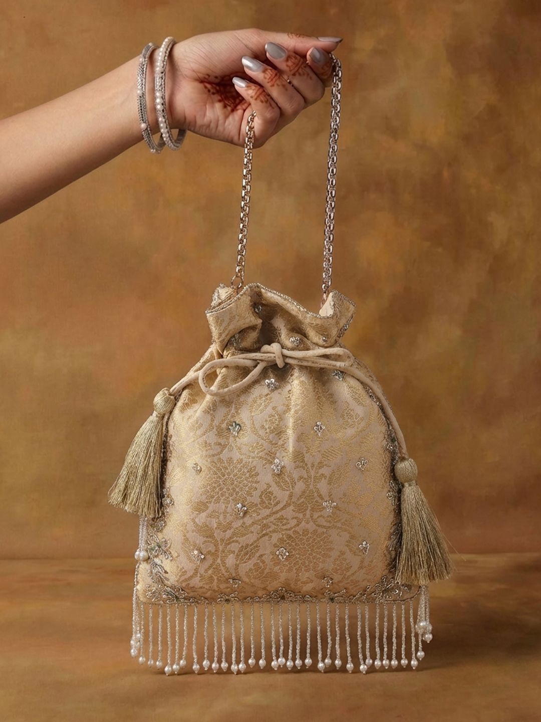 House of Pataudi Embellished Tasselled Potli Clutch-picture-54