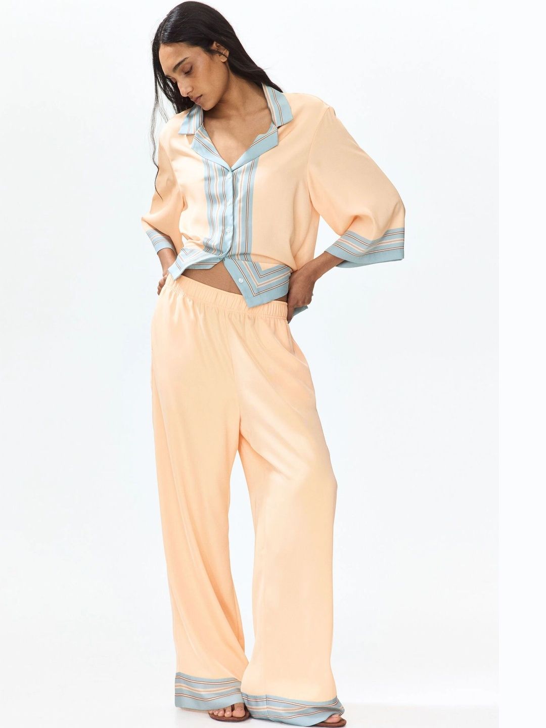 H&M Wide Drawstring Trousers deal from myntra