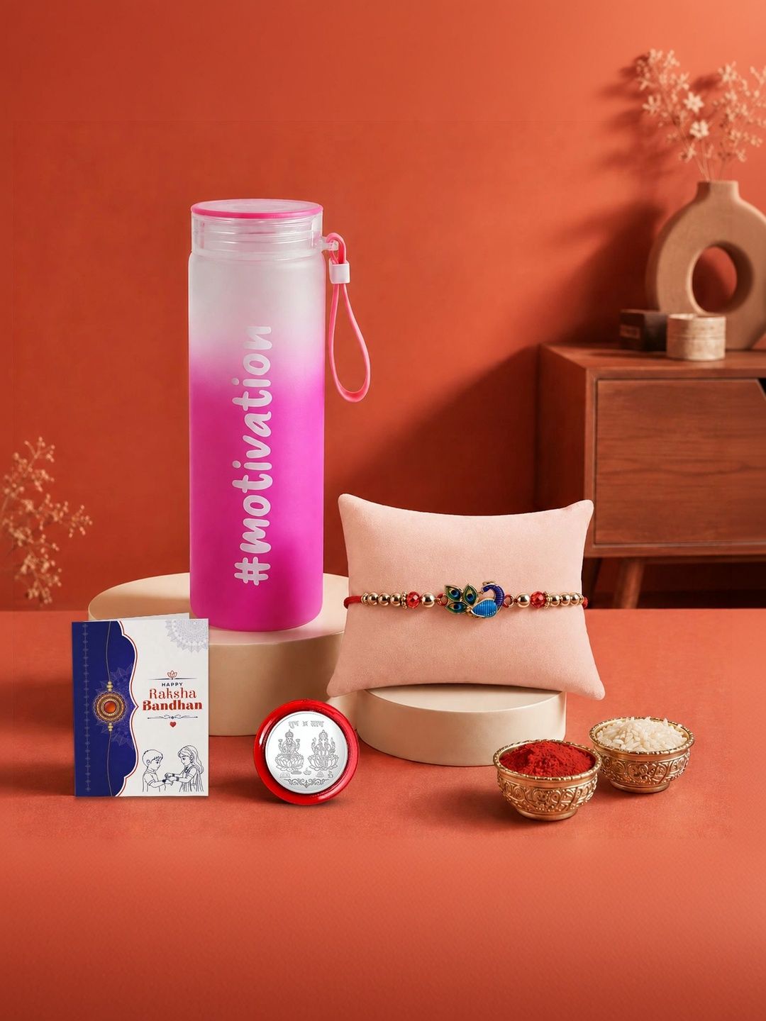Myntra Elegant Homes Rakhi With Greeting Card Water Bottle Silver Coin & Roli Chawal-picture-37