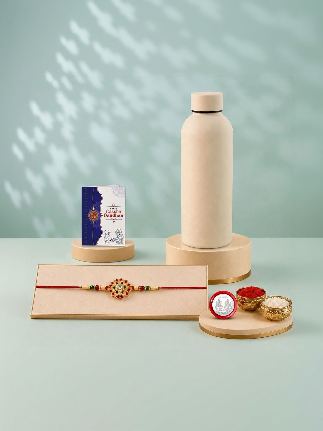 Myntra Elegant Homes Set of 1 Rakhi with Silver Coin Water Bottle-500 ml & Roli Chawal-picture-24